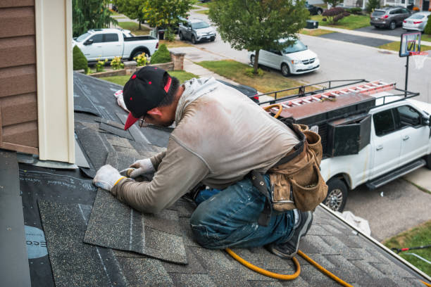 Professional Gutter Installation technician working in Cheltenham, MD